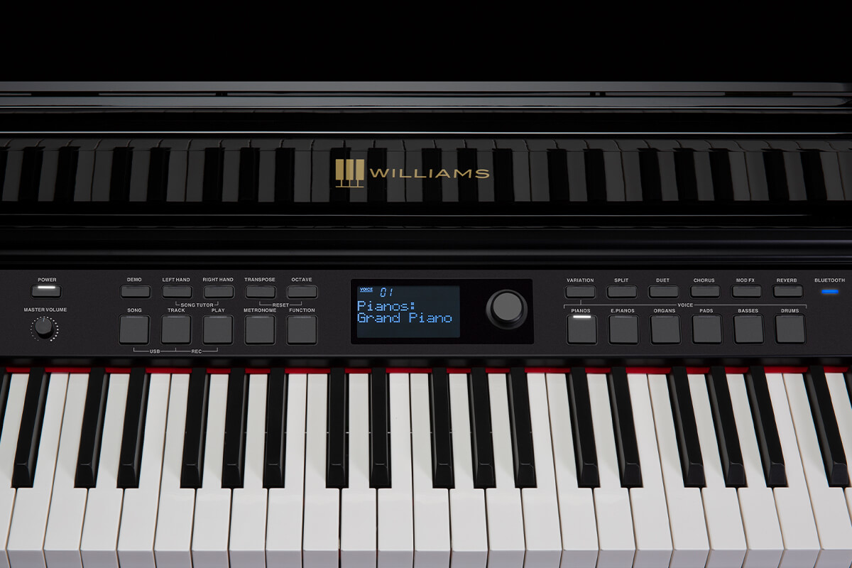 Williams Overture III digital console piano key and panel close up.