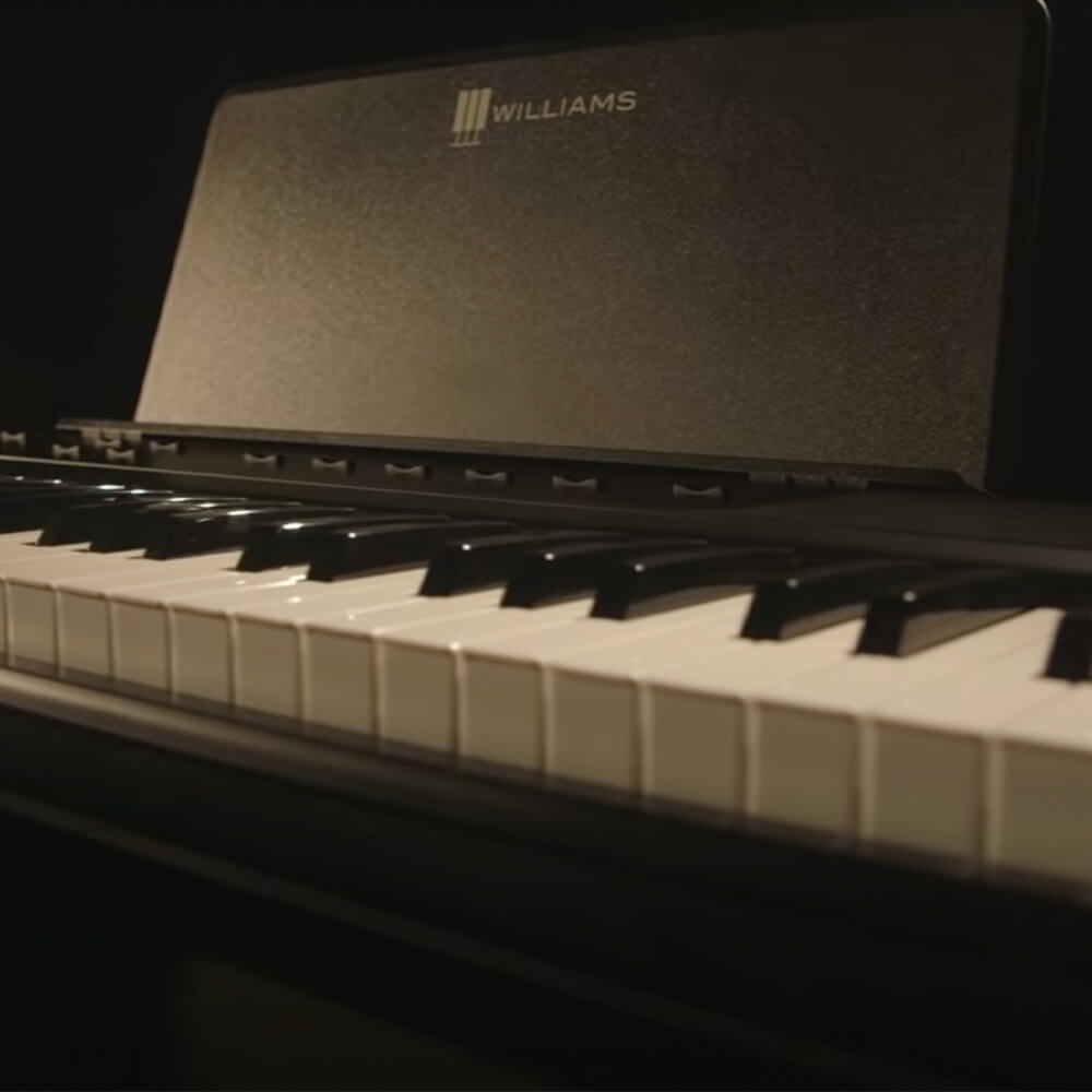 Williams Legato III digital piano keys close up.